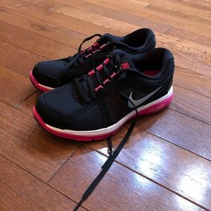 Black and pink Nike running shoes